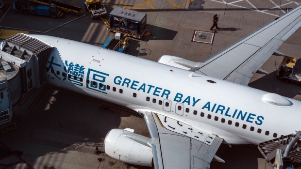 A Greater Bay Airlines Co. aircraft at Hong Kong International Airport. Photographer: LAM YIK/Bloomberg
