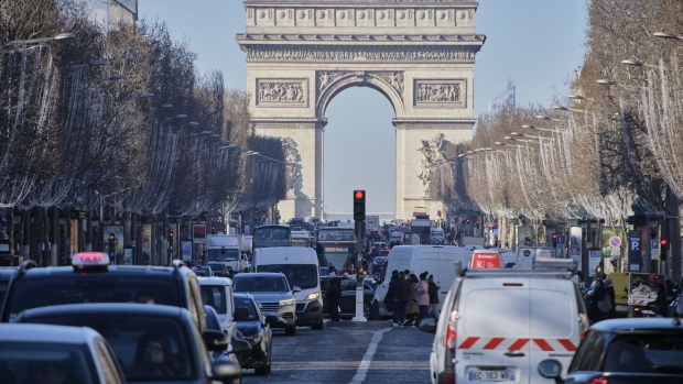 PARIS, FRANCE - JANUARY 19: Traffic is heavy on the avenue des Champs-Élysées despite warnings that pollution levels would be high on January 19, 2024 in Paris, France. Air quality in Paris and its close suburbs is qualified bad today as the cold weather spell and weak winds contribute to the poor elimination of car exhaust and home heating particles. The authorities have asked people to limit or refrain their car use, drive more slowly or use electric means of transportation. They also advise people to refrain from burning wood for heating. (Photo by Remon Haazen/Getty Images)
