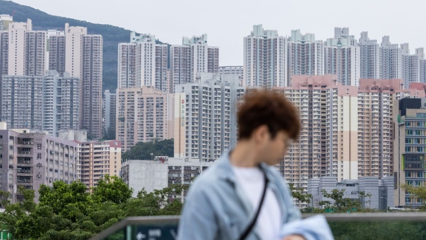 Residential buildings in Hong Kong, China, on Saturday, Oct. 21, 2023. Hong Kong's chief executive may announce cuts in property stamp duties during his policy address on Oct. 25, Sing Tao reported, as the city contends with a real estate slump. Photographer: Paul Yeung/Bloomberg