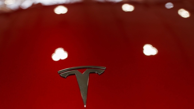A Tesla logo on the front of a Model Y during the Canadian International AutoShow in Toronto, Ontario, Canada, on Friday, Feb. 16, 2024. The general manager of the show said that the goal "is to drive consumer interest in automobiles and enthuse the marketplace," the Toronto Star reported. Photographer: Cole Burston/Bloomberg