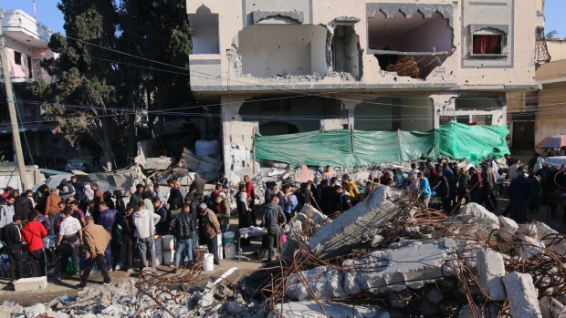 Building rubble beside a street market in the center of Deir al-Balah, central Gaza