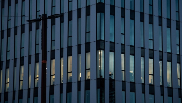 A partially-lit office building in Strasbourg, France, on Tuesday, Sept. 13, 2022. The European Commission unveiled an energy intervention plan that it said could raise more than 140 billion euros ($140 billion) for consumers by capping revenues from low-cost producers. Photographer: Benjamin Girette/Bloomberg