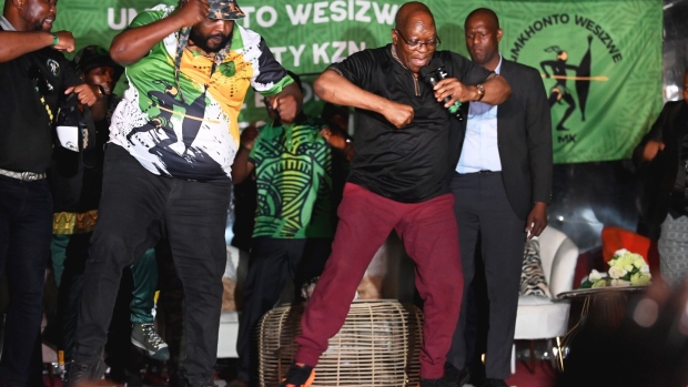 <p>Jacob Zuma dances on stage during an MKP rally outside his homestead in Nkandla, April 25.</p>
