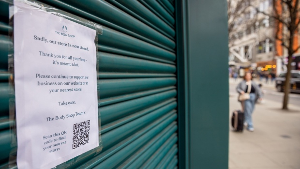 A closure notice on the shutters of a closed outlet of The Body Shop on Bond Street in central London, UK, on Tuesday, Feb. 20, 2024. The Body Shop is preparing to close almost half of its 198 UK stores after the retailer’s British operations fell into insolvency last week. Photographer: Betty Laura Zapata/Bloomberg