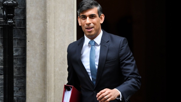 Rishi Sunak, UK prime minister, departs 10 Downing Street to attend a weekly questions and answers session in parliament in London, UK, on Wednesday, May 22, 2024. Sunak made reducing inflation one of his key goals last year, though easing price pressures have not resulted in an improvement in the ruling Conservative Party’s standing in polls. Photographer: Chris J. Ratcliffe/Bloomberg