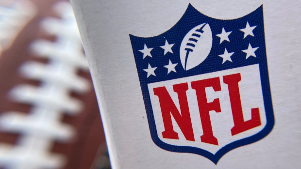 The NFL logo is seen on a football packaging in Los Angeles. Photographer: Chris Delmas/AFP/Getty Images