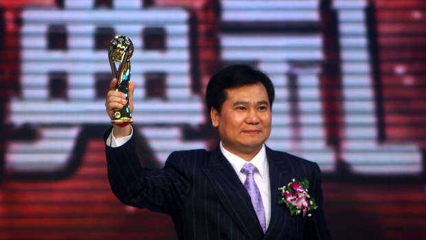 Zhang celebrates after being presented award of the 2006 People of Economy during the 2006 CCTV Awards ceremony in Beijing in 2007.