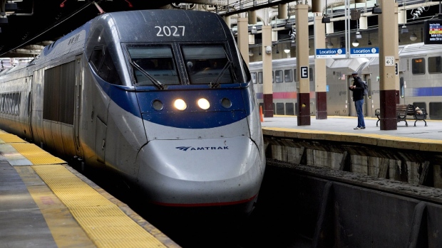 <p>An Amtrak train arrives at Newark Pennsylvania Station in Newark, New Jersey.</p>