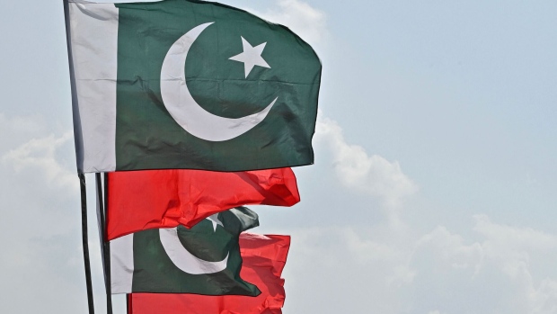 The national flags of China and Pakistan in Islamabad. Photographer: Farooq Naeem/Getty Images