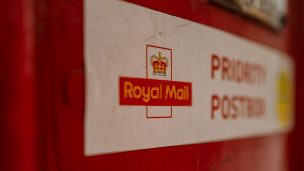 A Royal Mail logo on a "Priority Postbox" sticker on a double aperture pillar postbox in London, UK, on Thursday, May 18, 2023. International Distributions Services Plc, which owns the UK Royal Mail postal service, reported an operating loss of £1 billion ($1.25 billion) after the beleaguered delivery service endured a long dispute with a trade union. Photographer: Jose Sarmento Matos/Bloomberg
