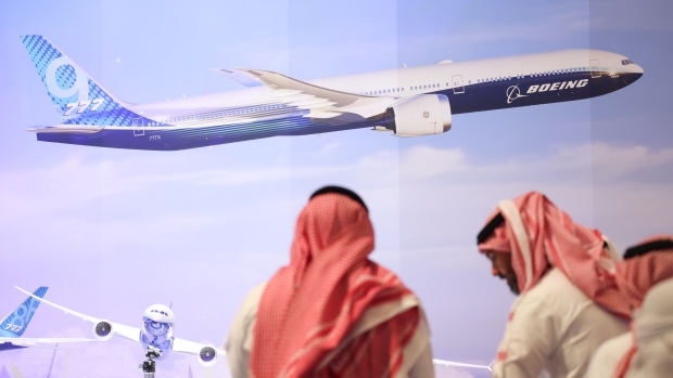 An image of the Boeing Co. 777-9 passenger aircraft, a variant of the 777X, at the Boeing Co. pavilion at the Dubai Air Show in Dubai, United Arab Emirates, on Monday, Nov. 13, 2023. The 2023 Dubai Air Show kicked off on Monday with high expectations of large deals, continuing the prevailing theme of this year that’s seen airlines commit to huge orders.