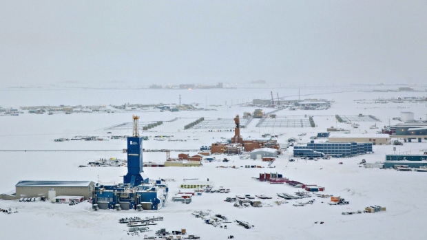 Drill rigs and oil field support facilities stand near Deadhorse Airport in Prudhoe Bay, Alaska, U.S., on Wednesday, Feb. 15, 2017. Four decades after the Trans Alaska Pipeline System went live, transforming the North Slope into a modern-day Klondike, many Alaskans fear the best days have passed. Photographer: Daniel Acker/Bloomberg
