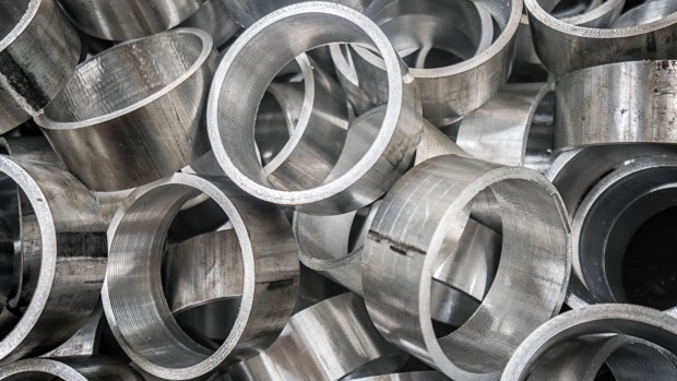 Titanium ring components for aircraft air-cooling system at a manufacturing site.