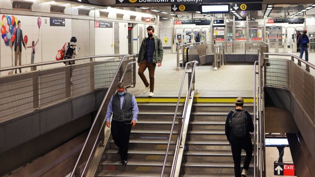 <p>People walk along the the Second Avenue subway station in 2021. </p>