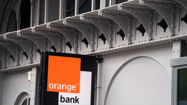 An Orange Bank sign outside the Orange SA headquarters in Paris, France. Photographer: Nathan Laine/Bloomberg