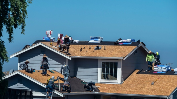 Workers install roofing on a home in Crockett, California, US, on Thursday, June 6, 2024. The Mortgage Bankers Association is scheduled to release mortgage applications figures on June 12.
