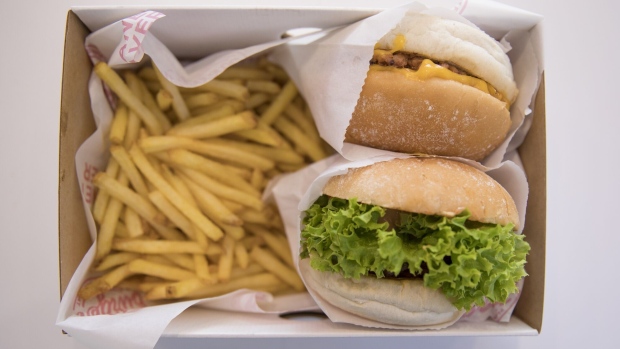 Meat-free burgers and fries sit in a container during the launch of the Neat Burger fast-food joint in London, U.K., on Monday, Sept. 2, 2019. Fast-food chains have been quick this year to offer plant-based meat and dairy substitutes in a race to win over consumers looking to cut down on animal protein, out of environmental or health concerns. Photographer: Jason Alden/Bloomberg