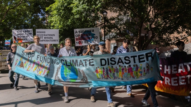 <p>Climate activists during a protest in New York on June 10.</p>
