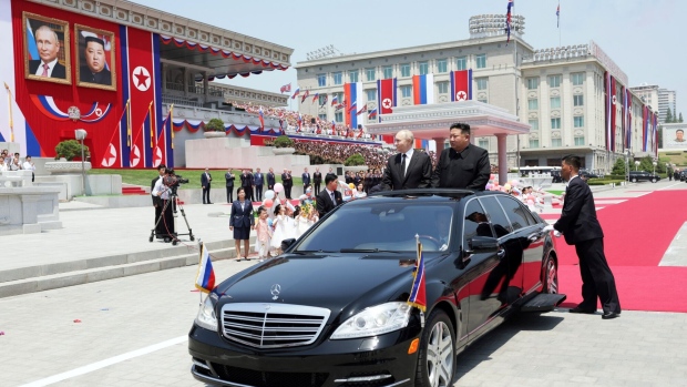Kim Jong Un and Vladimir Putin in Pyongyang on June 19 in a photo released by Russian state media. Photographer: Gavriil Grigorov/AFP/Getty Images
