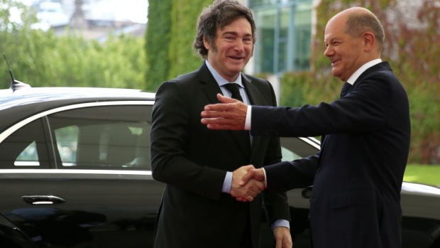 <p>Olaf Scholz greets Javier Milei upon his arrival in Berlin, June 23.</p>