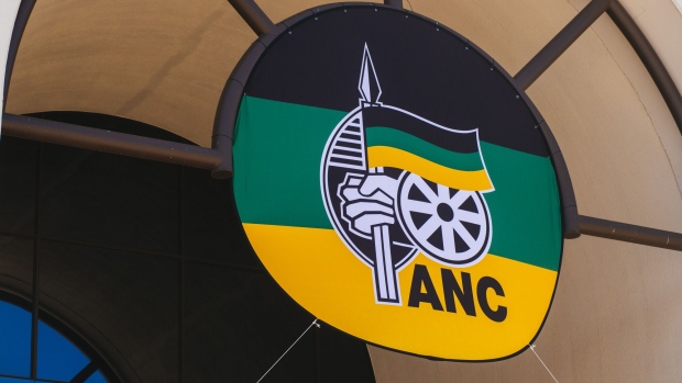 ANC signage sits above a doorway during the 54th national conference of the African National Congress party (ANC) in Johannesburg, South Africa, on Saturday, Dec. 16, 2017. The party’s National Executive Committee had decided that delegates from 50 ANC branches in the North West and Free State and the party leaders from the KwaZulu-Natal and Free State provinces, whose election was declared invalid in court rulings on Friday, won’t be allowed to vote for the ANC’s new leadership, secretary general Gwede Mantashe said.