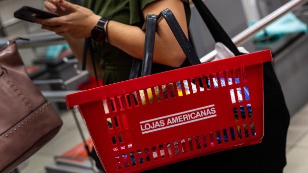 <p>A shopper at an Americanas store in Sao Paulo.</p>