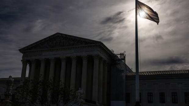 An American flag outside the US Supreme Court in Washington, DC, US, on Thursday, June 27, 2024. The US Supreme Court is poised to allow abortions in medical emergencies in Idaho, according to a copy of an opinion that was briefly posted on the court’s website.