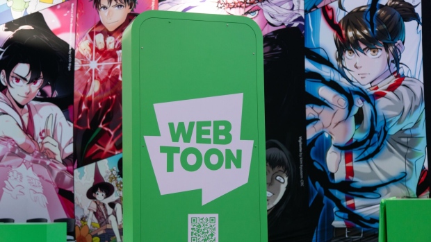Webtoon Entertainment Inc. signage during the initial public offering event outside the Nasdaq MarketSite in New York, US, on Thursday, June 27, 2024. Webtoon Entertainment Inc. is seeking to raise as much as $315 million in a US initial public offering after backer Naver Corp. this year accelerated plans for its market debut.