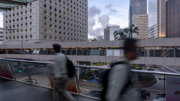 Some investors worry that the government’s preoccupation with national security could affect commercial interests. Photographer: Paul Yeung/Bloomberg