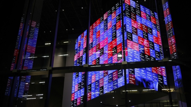 An illuminated electronic stock board displayed inside the Kabuto One building at night in Tokyo, Japan, on Thursday, June 27, 2024. The slump in the yen has gone so far that its no longer giving a boost to Japanese stocks. Photographer: Kiyoshi Ota/Bloomberg
