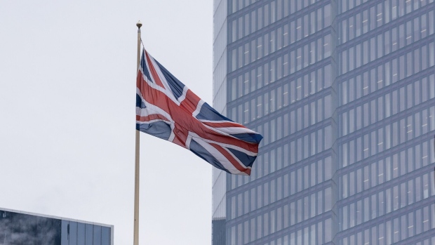 A British Union flag near office buildings. Photographer: Chris Ratcliffe/Bloomberg
