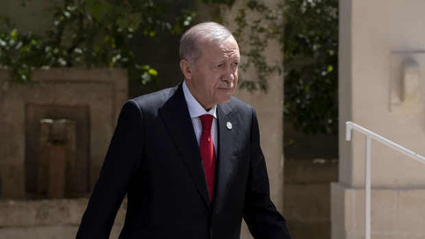 Recep Tayyip Erdogan, Turkey's president, on day two of the Group of Seven (G-7) leaders summit at the Borgo Egnazia resort in Savelletri, Italy, on Friday, June 14, 2024. Group of Seven leaders are set to reach a political agreement to provide Ukraine with $50 billion of aid using the profits generated by frozen Russian sovereign assets, according to an Elysee official. Photographer: Francesca Volpi/Bloomberg