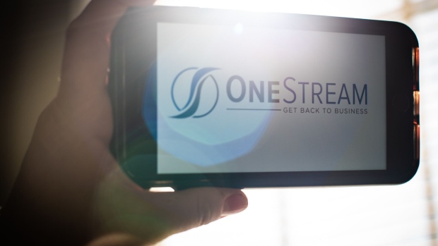 The OneStream logo displayed on a mobile phone arranged in Hastings on Hudson, New York, U.S., on Tuesday, April 6, 2021. KKR-backed OneStream Software, a maker of programs for chief financial officers, raised $200 million in a funding round that values the company at $6 billion. Photographer: Tiffany Hagler-Geard/Bloomberg
