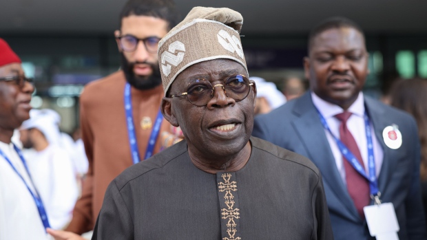 Bola Tinubu, Nigeria's president, on day two of the COP28 climate conference at Expo City in Dubai, United Arab Emirates, on Friday, Dec. 1, 2023. More than 70,000 politicians, diplomats, campaigners, financiers and business leaders will fly to Dubai to talk about arresting the world’s slide toward environmental catastrophe. Photographer: Hollie Adams/Bloomberg