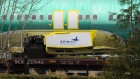 <p>Spirit AeroSystems signage on a Boeing 737 fuselage outside the Boeing manufacturing facility in Renton, Washington.</p>
