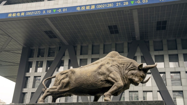 A bull statue in front of the Shenzhen Stock Exchange building in Shenzhen, China on Tuesday, May 7, 2024. As the Chinese bond market undergoes a powerful rally, the nation's so-called policy banks are turning away from the People's Bank of China as a source of funding and rushing to raise debt instead. Photographer: Raul Ariano/Bloomberg