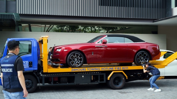 <p>A luxury vehicle seized by police at a residence of Su Jianfeng, one of the suspects in the S$2.8 billion money-laundering case, in Singapore in Oct 2023. </p>