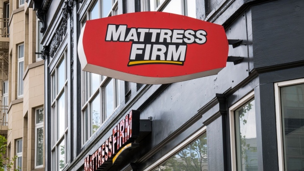 Signage for Mattress Firm Holdings Corp. is displayed on the front of a store in San Francisco, California, U.S., on Tuesday, March 24, 2020. Governors from coast to coast Friday told Americans not to leave home except for dire circumstances and ordered nonessential business to shut their doors. Photographer: David Paul Morris/Bloomberg