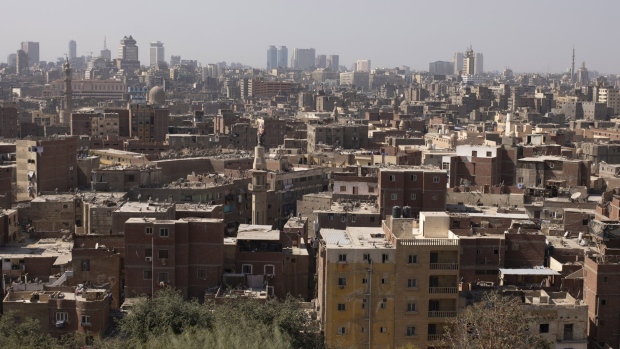 Residential apartment blocks on the city skyline beyond Al-Azhar Park in Old Cairo, Egypt, on Sunday, March 10, 2024. For a country mired in economic woes, the visitor boom painted a promising trajectory. Photographer: Jeremy Suyker/Bloomberg