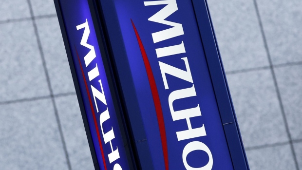 Signage for Mizuho Financial Group Inc. (MHFG) displayed outside a branch of Mizuho Bank Ltd. in Tokyo, Japan, on Monday, Jan. 31, 2022. Mizuho Financial Group is scheduled to release its third-quarter earnings announcement on February 2.