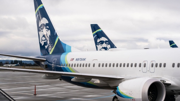 Alaska Airlines Boeing 737 Max-9 aircraft grounded at Seattle-Tacoma International Airport (SEA) in Seattle, Washington, US, on Saturday, Jan. 6, 2024. Alaska Airlines will ground its entire fleet of Boeing Co. 737 Max-9 aircraft after a fuselage section in the rear part of the brand-new jet blew out shortly after takeoff. Photographer: David Ryder/Bloomberg