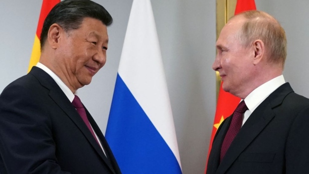 Vladimir Putin meets with Xi Jinping, in Astana. Photographer: Pavel Volkov/AFP/Getty Images