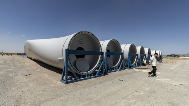 Wind turbine blades at a Ming Yang Smart Energy Group Ltd. plant in Baotou, Inner Mongolia, China, on Thursday, May 31, 2023. China will lift renewables capacity to about 3.9 terawatts by 2030, more than three times the amount in 2022, BNEF said in a report last week. Photographer: Qilai Shen/Bloomberg